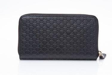 GUCCI Black Leather Microguccissima Zip Around Wallet
