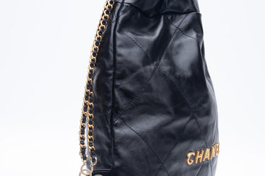 CHANEL Black Shiny Calfskin Quilted Chanel 22 Backpack