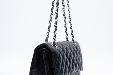 CHANEL Black Lambskin Quilted Medium Double Flap Bag