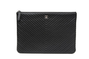 CHANEL Black Chevron Caviar Quilted O Case Clutch