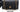 CHANEL Black Quilted Caviar Medium Double Classic Flap Bag