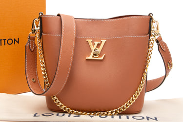 LOUIS VUITTON Cognac Lock and Walk Bag