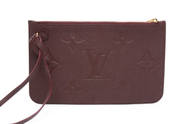 LOUIS VUITTON Wine Monogram Empreinte Leather Wristlet (New)