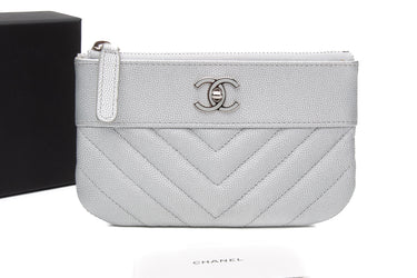 CHANEL Metallic Silver Caviar Chevron Quilted Small Mademoiselle Zip Pouch Case