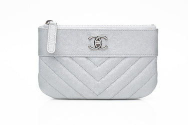 CHANEL Metallic Silver Caviar Chevron Quilted Small Mademoiselle Zip Pouch Case