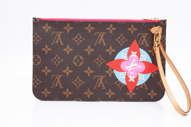 LOUIS VUITTON Monogram World Tour Wristlet