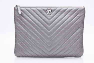 CHANEL Silver Chevron Quilted Lambskin O Case Clutch