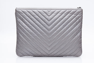 CHANEL Silver Chevron Quilted Lambskin O Case Clutch