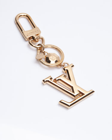 Louis Vuitton Goldtone Metal Luggage Tag Key Holder and Bag Charm - Yoogi's  Closet