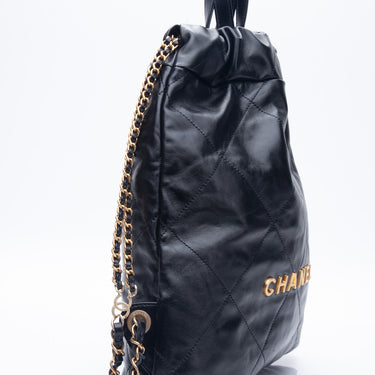 CHANEL Black Shiny Calfskin Quilted Chanel 22 Backpack