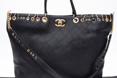 CHANEL Black Caviar Quilted Grommet Embellished Piercing Chic Tote Bag