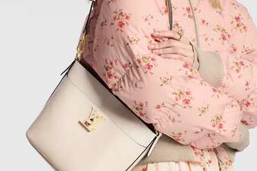 LOUIS VUITTON Quartz Lock and Walk Lockme Bag